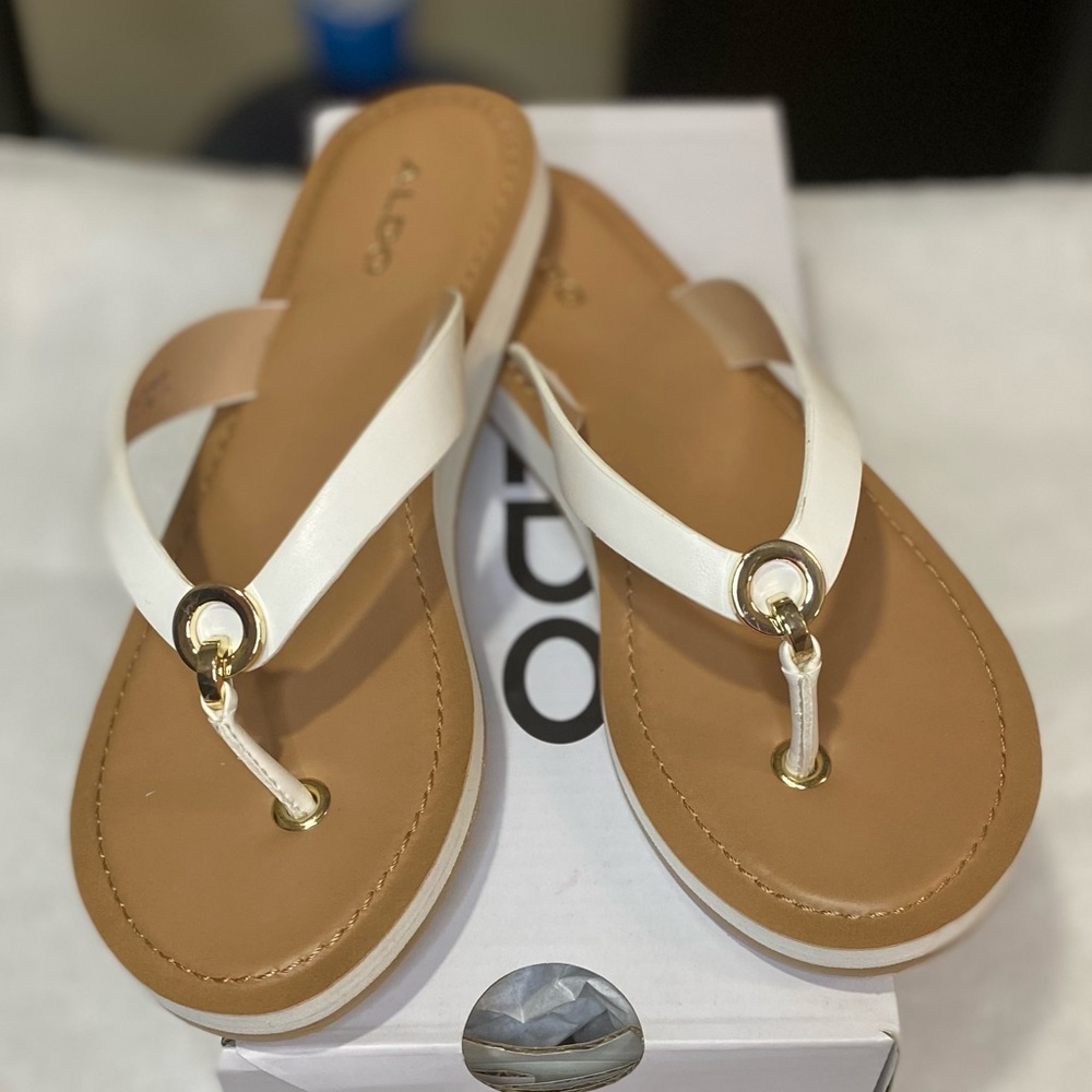 White flat sandals